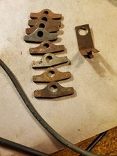 1965-74 Chevrolet 283-350 OEM Valve cover Holddown spacers n Vacuum Advance Brkt picture