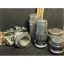 Minolta SRT 101 35mm Film Camera: with 55mm, 28mm, 200mm Lenses, Cases and Strap picture