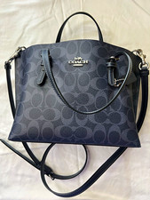 The Coach Molly Tote 25 Dark Navy with matching leather wristlet pouch picture