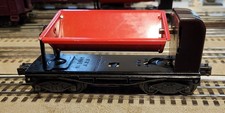 LIONEL SCARCE 3559 DUMP CAR WITH BROWN BAKELITE MOTOR HOUSING IN GOOD COND. OB. picture