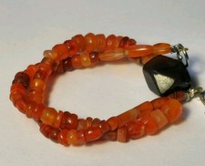 A BRACELET OF ANCIENT INDUS BACTRIAN CARNELIAN & CORNERLESS CUBE AGATE BEADS picture