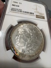 1886 Morgan Silver Dollar Graded NGC MS 64 Small Cats Eye Rainbow Toning $1 Coin picture