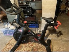 Gently/Rarely Used Peloton Bike (+ W7.5 Clip In Shoes, Mat, Handweights 2) picture