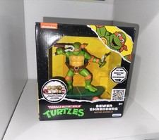 Teenage Mutant Ninja Turtles Michelangelo Action Figure Sewer Shredders picture