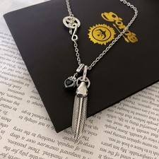Goro's Double Feather Pendant Necklace — Vintage-Style Couple's Edition picture