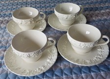 SET OF 4 WEDGWOOD EMBOSSED QUEENSWARE CREAM  CUP AND SAUCERS UNUSED picture