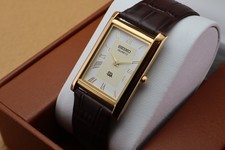 Vintage Seiko Slim Quartz Men's Wrist Watch White  Dial with Dark Brown Strap. picture