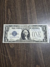 1928A $1, silver certificate. Circulate With folds and stains. picture