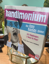 Handimonium: The Tiny Hands Game with 4 Tiny Hands - NIB - Complete picture
