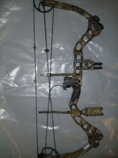 Quest G5 Rogue compound hunting bow configured in a camo finish. picture