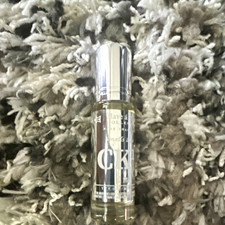 Calvin Klein CK One Eau de Toilette Spray Travel Size 0.5 fl oz picture