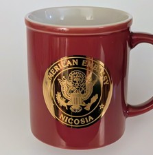 Nicosa America Embassy Ceramic Coffee Mug Maroon Red Gold Seal Trim Excellent picture