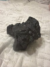 possibly a media, right? or a moon rock not 100% sure. picture