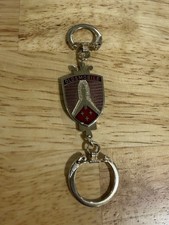 Vintage 1960s Oldsmobile Rocket Keychain Double Key Ring GM Auto Memorabilia Adv picture