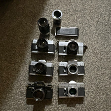 Vintage SLR cameras and other items picture