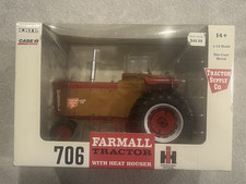 2010 Ertl IH Farmall 706 Toy Tractor with TSC Heat Houser, 1/16 Scale, NIB picture