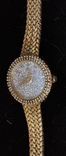 VINTAGE GOLD TONE DIAMOND DUST DIAL WATCH WITH BRAIDED BRACELET picture