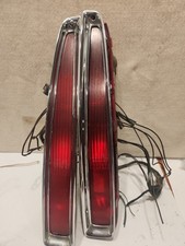 1994-1999  Cadillac Deville- Tail Lights (pair) w/ Chrome Trim picture