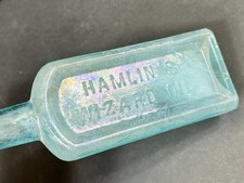 Antique 1890s Hamlin's Wizard Oil Bottle Aqua Iridescent Embossed Medicine Quack picture