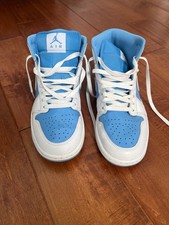 Light blue boys Air Jordan tennis shoes size 8.5, barely worn. picture