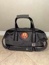 Carhart Grey And Black Duffel Bag.       20in By 11in.       2 in stock picture