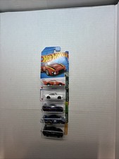 Porsche 935 and 911 Bundle Lot.  Orange Porsche Slight Crease J Hook. On Sale. picture
