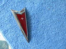 NOS 1976-1980 PONTIAC SUNBIRD DIECAST METAL HEADER PANEL EMBLEM-PART 499791 picture