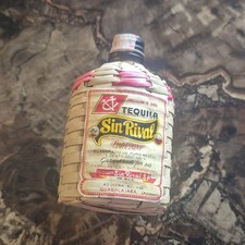 Small Antique Wicker Wrapped Brown Glass Bottle picture