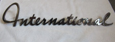 1960 - 1967 INTERNATIONAL TRUCK FENDER EMBLEM OEM PART # 242692-R1 TRAVELALL picture