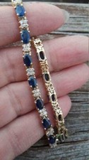 18Ct Oval Cut Sapphire & Diamond Women's Tennis Bracelet In 14K Yellow Gold Over picture