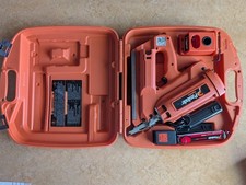 Paslode Cordless Framing Nailer Model 900420 and charger, case, and fuel cell picture