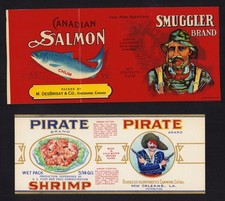 Lot of 2 can labels depicting outlaws of the seas vintage 1920s/30s Smuggler picture