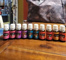 Used Young Living Essential Oils Lot w/ Diffuser, Bag, Roller Bottles & Book. picture