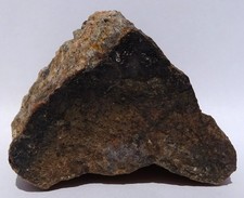 Hefty ALLANITE-(Ce)--Kingman Feldspar quarry, Arizona--Coll. by Dr Ray Grant '93 picture
