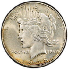 1935-P PCGS Genuine UNC Peace Dollar | Rainbow Toning | 40th Anniversary Label picture