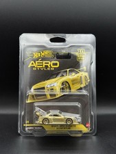Hot Wheels 2026 Aéro Styles Nissan Skyline R34 LBWK Gold Chase W/Protector picture