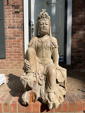 Carved wooden Guanyin statue, 34
