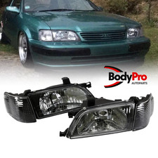 For 1995-1999 Toyota Tercel Headlight Clear Lens HeadLamp Black Set Left+Right picture