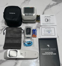 Vital Sign Devices; Included are Thermometer, Pulse oximeter and Bp machine. picture
