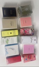 12 Brands featured include Chanel, Dior, Gucci, and YSL, often packaged in sets picture