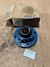 NEW IN BOX SKF 4-BOLT ROUND FLANGE BEARING 2