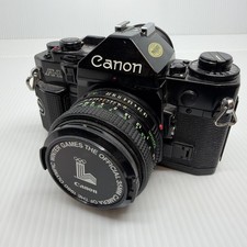 Canon A-1 35mm SLR Film Camera with 50 mm lens Kit picture