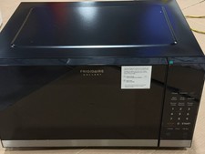 FRIGIDAIRE GALLERY 2.2 CU. FT MICROWAVE SENSOR COOKING - BLACK STAINLESS STEEL picture