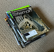 Large 24 magazine lot of various firearms and gun sports magazines. picture