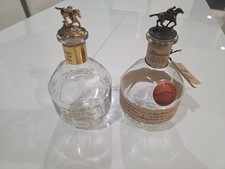 Blanton’s Single Barrel and Gold - empty bottles with toppers L and N picture