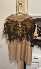 Xtreme Couture Graphic T-Shirt with Skull and Text Design picture