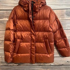 Everlane puffer jacket in rust. picture