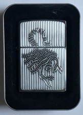 1999 Vintage Unfired Zippo Lighter Silver Tone With A Embossed Scorpion On It picture