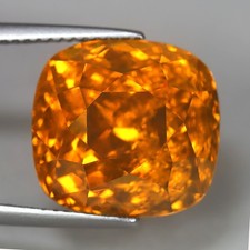 19.70CT ZIRCON TRUE GOLDEN ORANGE COLORATION CUSHION CUT GEMSTONE (SRI LANKA) picture