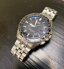 Citizen Eco-Drive H144-S067383 Perpetual Calendar Titanium Watch picture